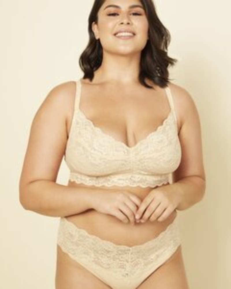 Front of a model wearing a size 1X Cutie Low Rise Thong in Blush by Cosabella. | dia_product_style_image_id:253645